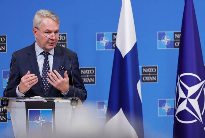 Finland’s FM signs application for NATO membership