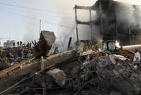Aún habría personas atrapadas bajo los escombros del centro comercial siniestrado en Ereván