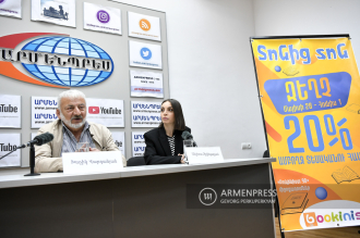 Bookinist director Khachik Vardanyan and head of 
communication department Aelita Chilingaryan give press 
conference 